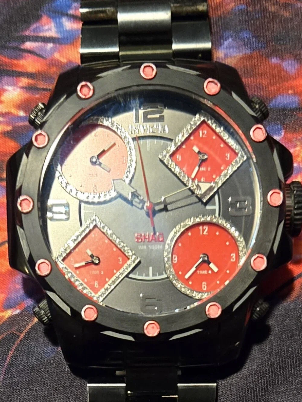 Invicta Men’s Black Watch with Red Dial Accents